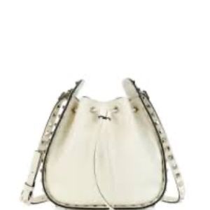 Valentino small rockstud drawstring crossbody bag. Ivory with gold rock studs.